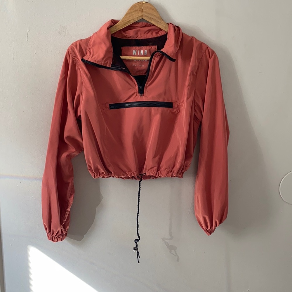 pink cropped wind breaker